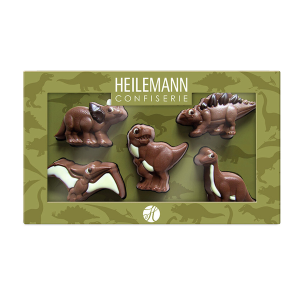 Heilemann Geschenkpackung mit Schokoladen-Dinosauriern im Sichtfenster