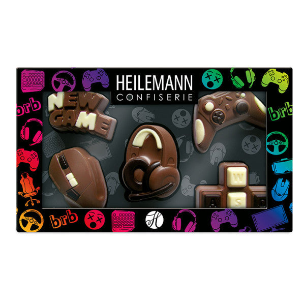 Gaming-Schokoladenfiguren von Heilemann Confiserie in Verpackung mit Controller, Headset und Blöcken