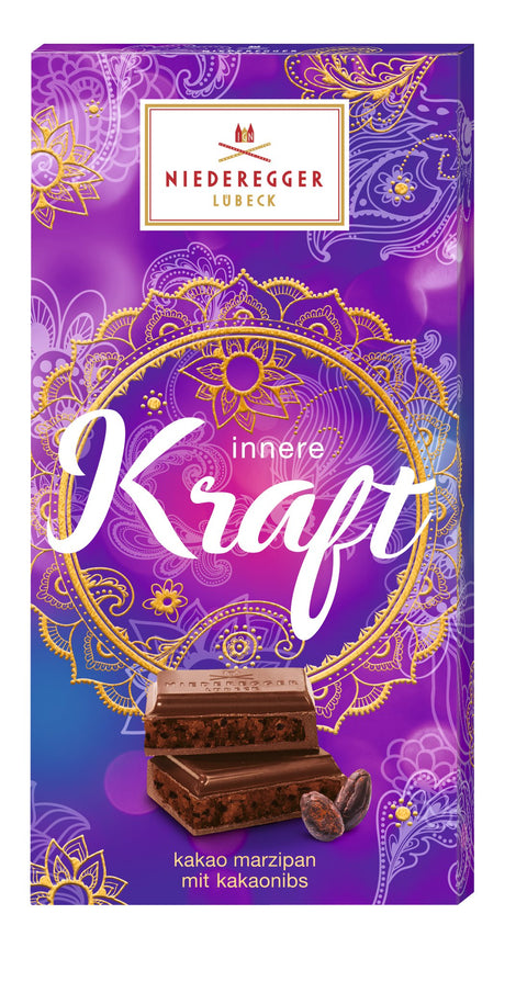 Marzipan-Kakao-Tafel Innere Kraft 110 g in violetter Packung von Niederreger Lübeck