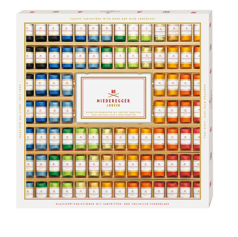 Geschenkbox mit Marzipanvariationen: Reihe Mini-Pralinen in Blau bis Orange