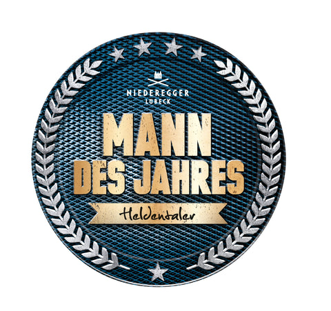 Runder Heldentaler-Keks „MANN DES JAHRES“ (185 g) mit blauem Wappenmotiv