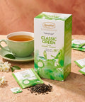 Ronnefeldt Teavelope Classic Green Bio-Grüntee in grüner Packung mit Teebeuteln und Tasse