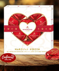 Marzipanherzen-Pralinen in roter Geschenkbox mit Herzen-Design, dunkel schokoliert