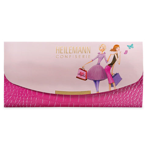 Schokoladenverpackung mit pinkem Prägelederlook und Abdeckung mit Mädchenmotiv, HEILEMANN